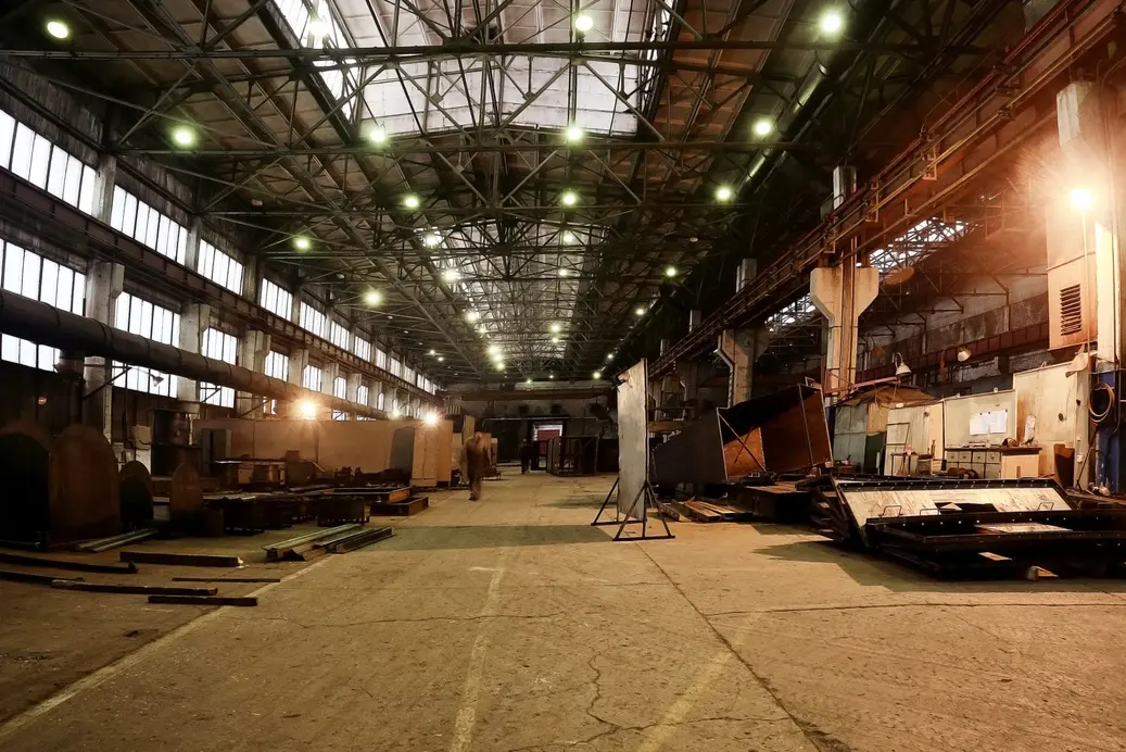 Industrial production floor illuminated for shift work